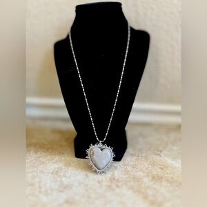 Handmade heart necklace made in Mexico  
Gray